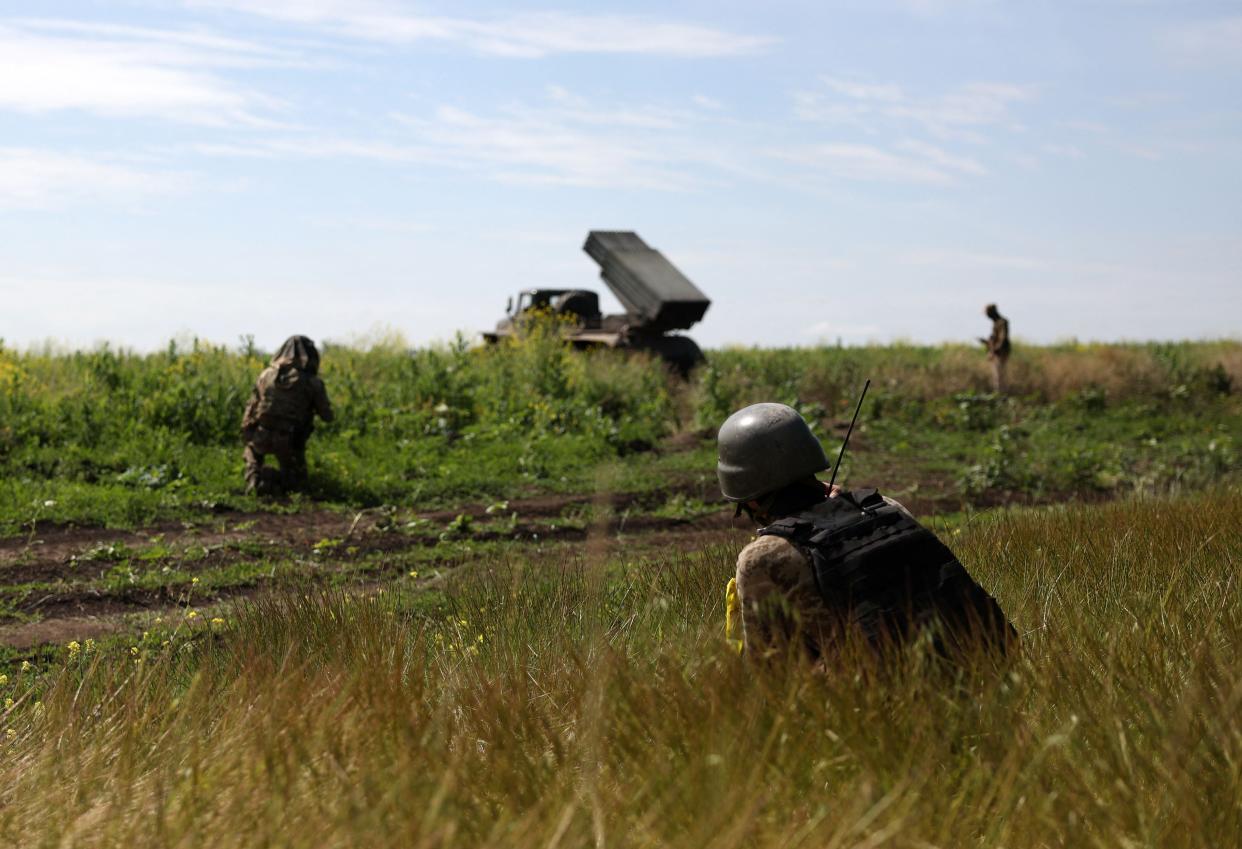 Ukrainian servicemen of the 10th Mountain Assault Brigade “Edelweiss” prepare a BM-21 ‘Grad’ multiple rocket launcher towards Russian positions near Bakhmut in the Donetsk region yesterday (AFP via Getty Images)