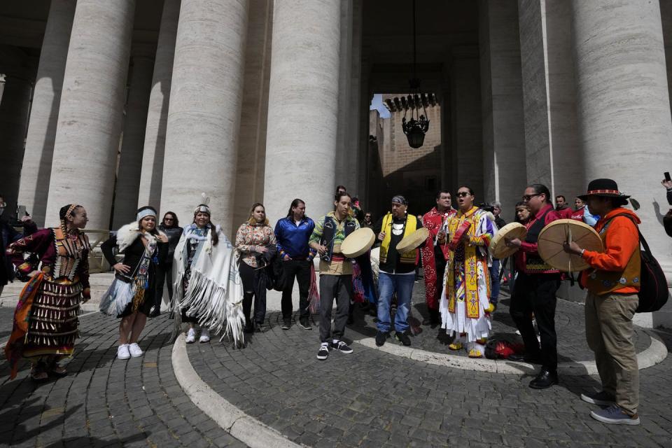 Indigenous delegates from across Canada drum at the Vatican, April 1, 2022. (AP Photo/Alessandra Tarantino)