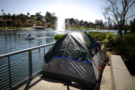 A tent is seen next to Echo Park Lake in Los Angeles, California, U.S. April 11, 2018. Picture taken April 11, 2018. REUTERS/Lucy Nicholson