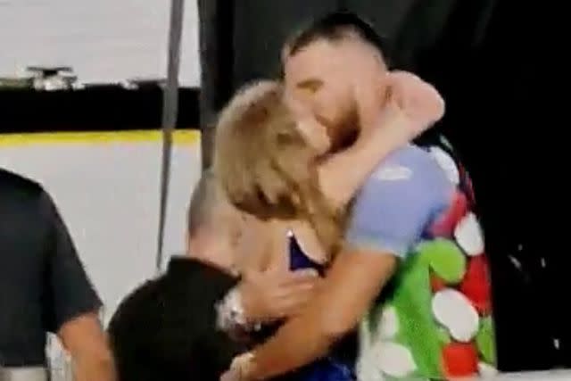 <p>Mike Djordj / Splash</p> Taylor Swift and Travis Kelce kiss after he attends her tour in Buenos Aires