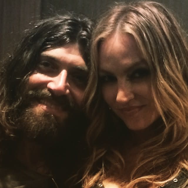 Drea de Matteo and her boyfriend, Whitesnake bass player Michael Devin, took their relationship to the next level during a concert in Atlantic City, New Jersey on July 25. During Whitesnake's performance, the band stopped the show so that Devin could call up the <em>Sons of Anarchy</em> actress to the stage. "I fell in love with a very beautiful woman a few years ago, and I want to embarrass her as much as I can," Devin said, laughing. <strong>WATCH: 9 Celeb Weddings We Can't Wait For </strong> De Mateo, along with her 7-year-old daughter Alabama and 4-year-old son Waylon -- who she shares with her ex Shooter Jennings -- came up into the spotlight where Devin shared, "I've been in love with you since the day I met you and I will for the rest of my life, and I hope that you'll marry me." The entire, heartfelt proposal can be seen in the video below. There's some NSFW language, but it's still super sweet. On Tuesday, Devin shared a loving pic of the happy, newly engaged couple on Instagram. <strong>WATCH: Celebrity Summer Wedding Watch -- Who's Getting Hitched? </strong> "Big Huge Thank You for all the Birthday wishes," he captioned the sweet photo. "And for all the blessings on my engagement to this kitty cat ... Much appreciated!"
