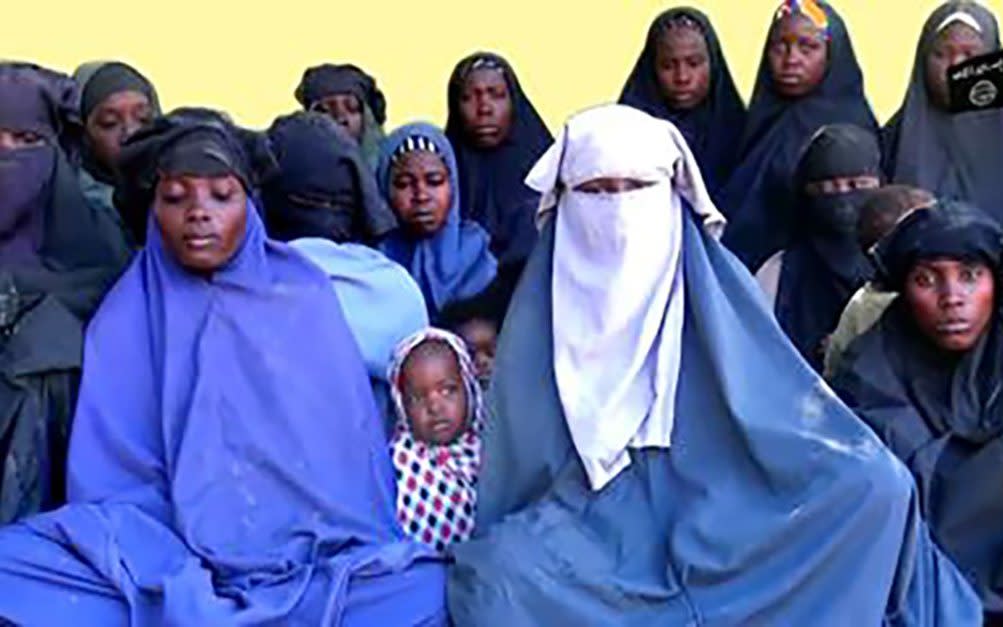 A video released on Monday by Boko Haram shows at least 14 of the schoolgirls abducted from the northeast Nigerian town of Chibok in April 2014 - AFP