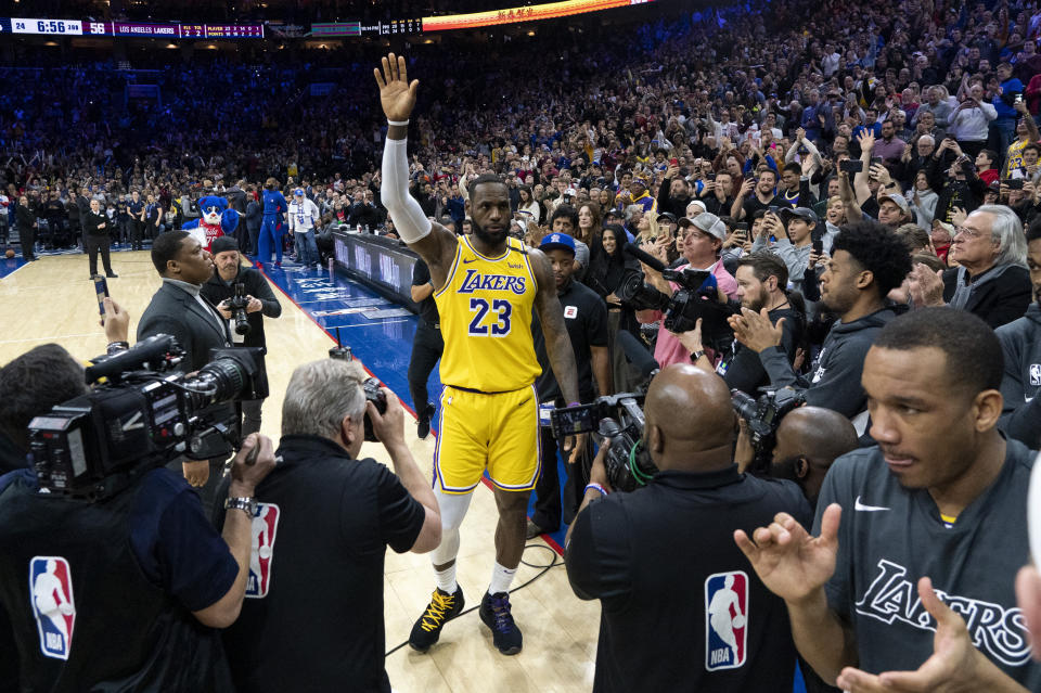 Los Angeles Lakers' LeBron James (23) reacts after moving to No. 3 on the NBA's career scoring list during the second half of a basketball game against the Philadelphia 76ers, Saturday, Jan. 25, 2020, in Philadelphia. (AP Photo/Chris Szagola)