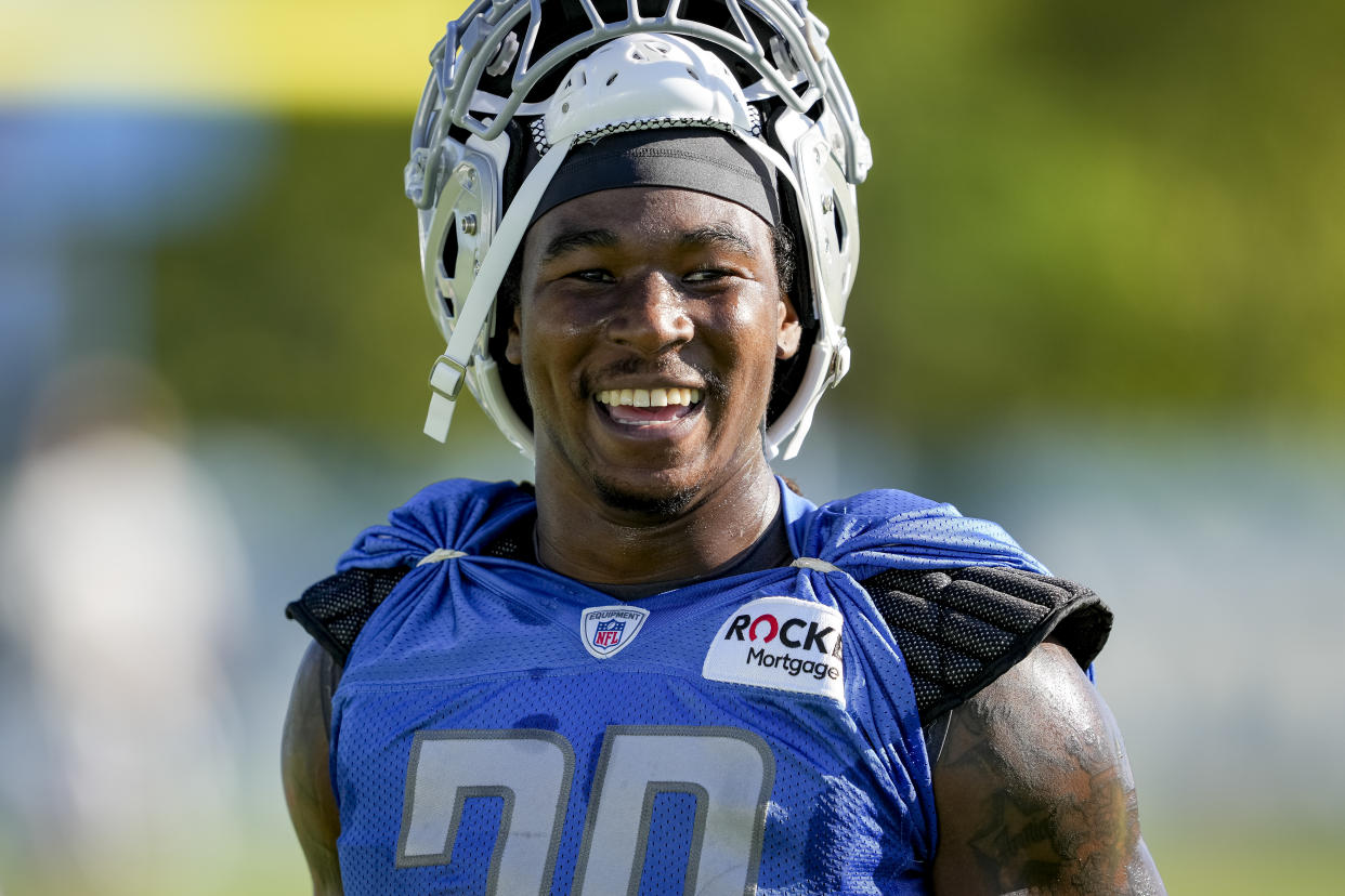 ALLEN PARK, MICHIGAN - JULY 29: Jamaal Williams #30 of the Detroit Lions laughs during the Detroit Lions Training Camp at the Lions Headquarters and Training Facility on July 29, 2022 in Allen Park, Michigan. (Photo by Nic Antaya/Getty Images)
