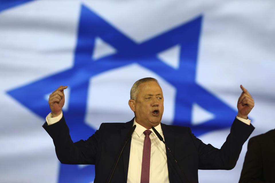 Blue and White party leader Benny Gantz addresses his supporters during election campaign rally in Tel Aviv, Israel, Saturday, Feb. 29, 2020. (AP Photo/Oded Balilty)