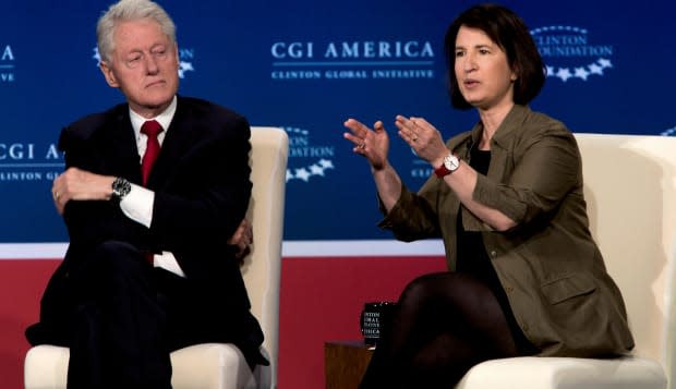 Denver, Colorado, USA. 24th June, 2014. BILL CLINTON listens as SARA HOROWITZ, Executive Director of the Freelancers Union, make