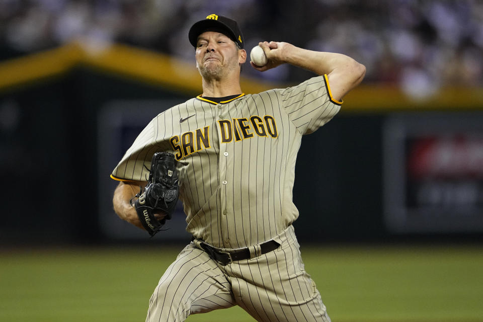San Diego Padres starting pitcher Rich Hill throws against the Arizona Diamondbacks during the first inning of a baseball game, Saturday, Aug. 12, 2023, in Phoenix. (AP Photo/Matt York)