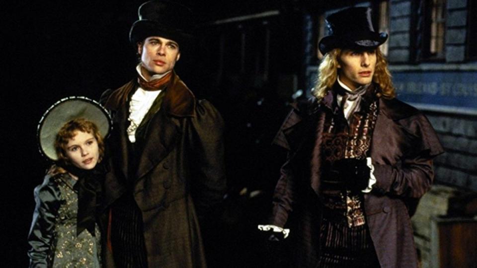 Kirsten Dunst, Brad Pitt, and Tom Cruis as Anee Rice's vampirc family in the movie version of Interveiww with the Vampire.