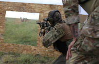 <p>Members of self-described patriot groups and militias run through shooting drills during III% United Patriots Field Training Exercise outside Fountain, Colo., July 29, 2017. (Photo: Jim Urquhart/Reuters) </p>