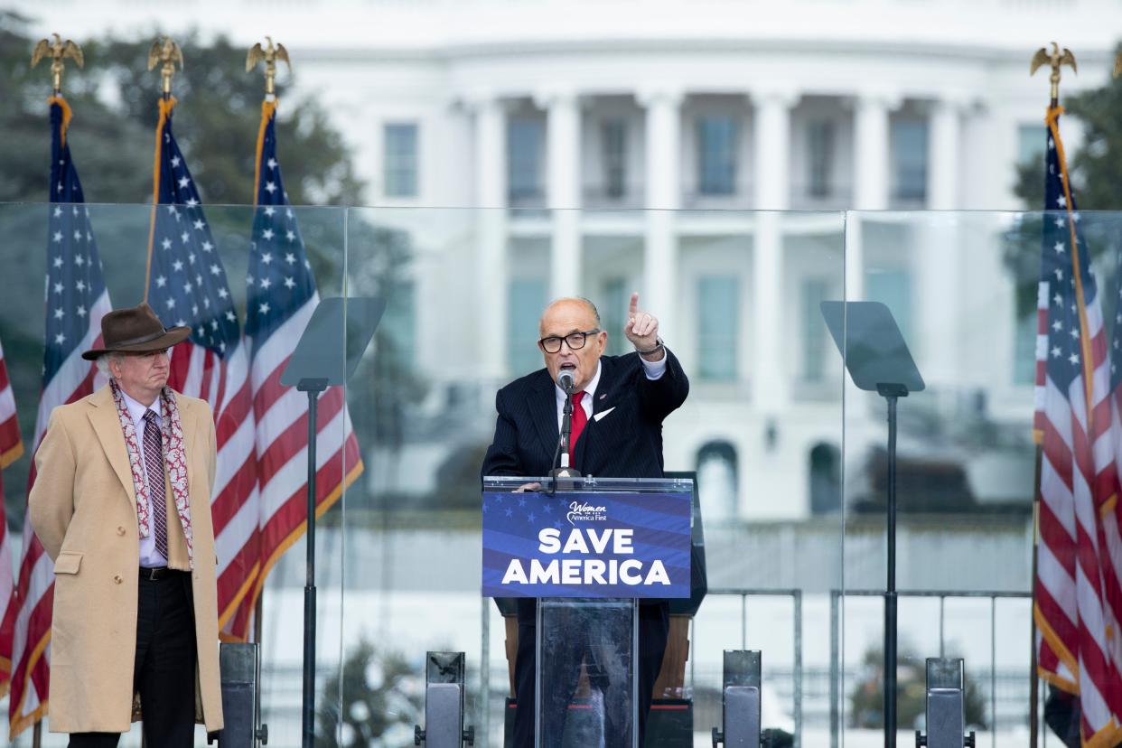 <p>Rudy Giuliani called on thousands of Donald Trump supporters on 6 January to settle the dispute over the election via “trial by combat” during rally</p> (Getty Images)