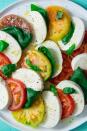 <p><a href="https://www.delish.com/uk/cooking/recipes/a28827847/caprese-bites-recipe/" rel="nofollow noopener" target="_blank" data-ylk="slk:Caprese salad;elm:context_link;itc:0;sec:content-canvas" class="link ">Caprese salad</a> is the ultimate example of simple preparation with fresh ingredients making amazing food, not just to eat but look at. It is also the best way to show off any tomatoes you saw at the farmer's market or have in your back garden.</p><p>Get the <a href="https://www.delish.com/uk/cooking/recipes/a32998471/easy-caprese-salad-recipe/" rel="nofollow noopener" target="_blank" data-ylk="slk:Caprese Salad;elm:context_link;itc:0;sec:content-canvas" class="link ">Caprese Salad</a> recipe.</p>