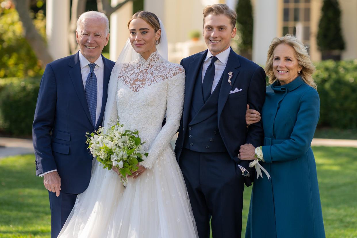 In this handout provided by The White House, President Joe Biden and First Lady Jill Biden attend the wedding of Peter Neal and Naomi Biden Neal on the South Lawn of the White House on November 19, 2022 in Washington DC.