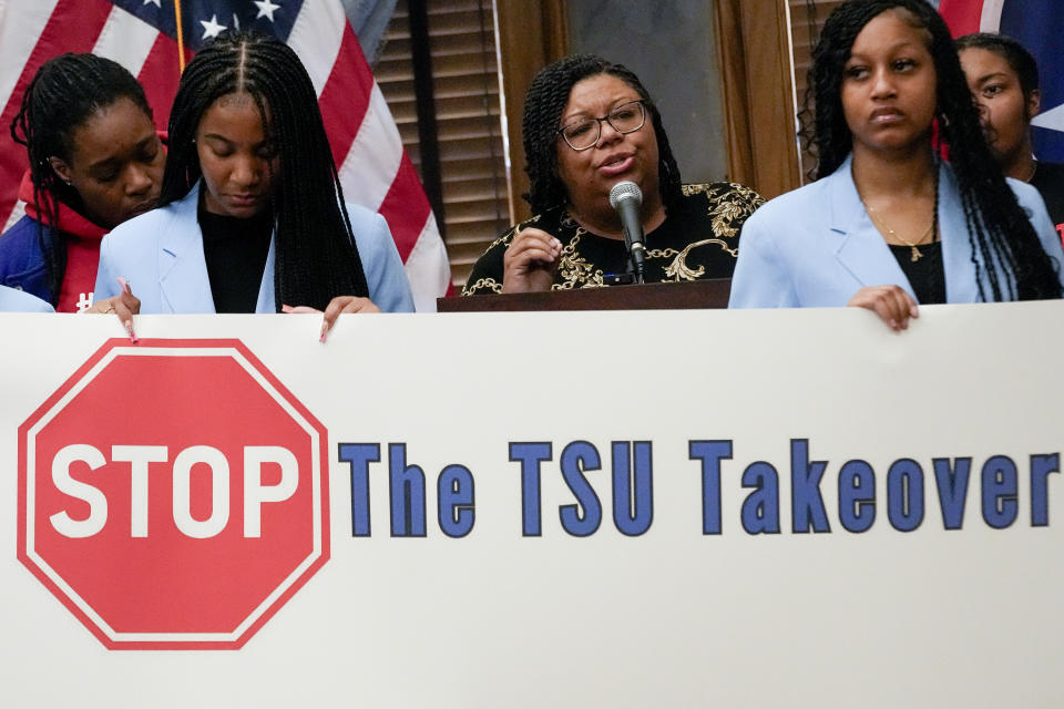 Delishia Porterfield, center, speaks in support of Tennessee State University during a news conference at the state Capitol, Thursday, March 28, 2024, in Nashville, Tenn. The state legislature voted to vacate the school's board of trustees. (AP Photo/George Walker IV)