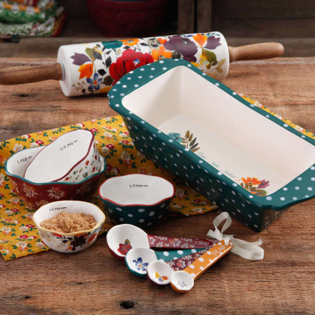 <p>The Pioneer Woman Harvest 10-Piece Bakeware Set has everything you need to make decadent and mouthwatering desserts and <a href="https://parade.com/986637/parade/casserole-recipes/" rel="nofollow noopener" target="_blank" data-ylk="slk:casseroles;elm:context_link;itc:0;sec:content-canvas" class="link ">casseroles</a>. The set includes a loaf pan, rolling pin, 4-piece measuring bowls, and 4-piece measuring spoons.</p><p><strong><a href="https://go.skimresources.com?id=113896X1572730&xs=1&url=https%3A%2F%2Fwww.walmart.com%2Fip%2FThe-Pioneer-Woman-Harvest-Bakeware-Set-10-Piece%2F53965598%3Fselected%3Dtrue&sref=parade.com%2Fshopping%2Fbest-gifts-under-100" rel="noopener" target="_blank" data-ylk="slk:The Pioneer Woman Harvest Bakeware Set, 10-Pieces, $39.92 at Walmart;elm:context_link;itc:0;sec:content-canvas" class="link ">The Pioneer Woman Harvest Bakeware Set, 10-Pieces, $39.92 at Walmart</a></strong></p><p>Walmart</p>