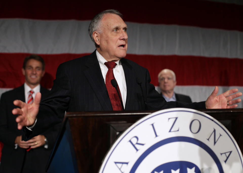 U.S. Senate Republican candidate Jeff Flake (L) and U.S. Senator John McCain (R) listen to former U.S. Senator Jon Kyl speak during the Republican Party election night event in Phoenix, Arizona. on&nbsp;Nov. 6, 2012.&nbsp;