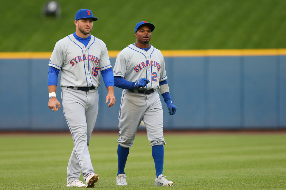 ALLENTOWN, PA - APRIL 30: Tim Tebow #15 and Rajai Davis #21 of the Syracuse Mets warm up before a AAA minor league baseball game against the Lehigh Valley Iron Pigs on April 30, 2019 at Coca Cola Park in Allentown, Pennsylvania. (Photo by Rich Schultz/Getty Images)