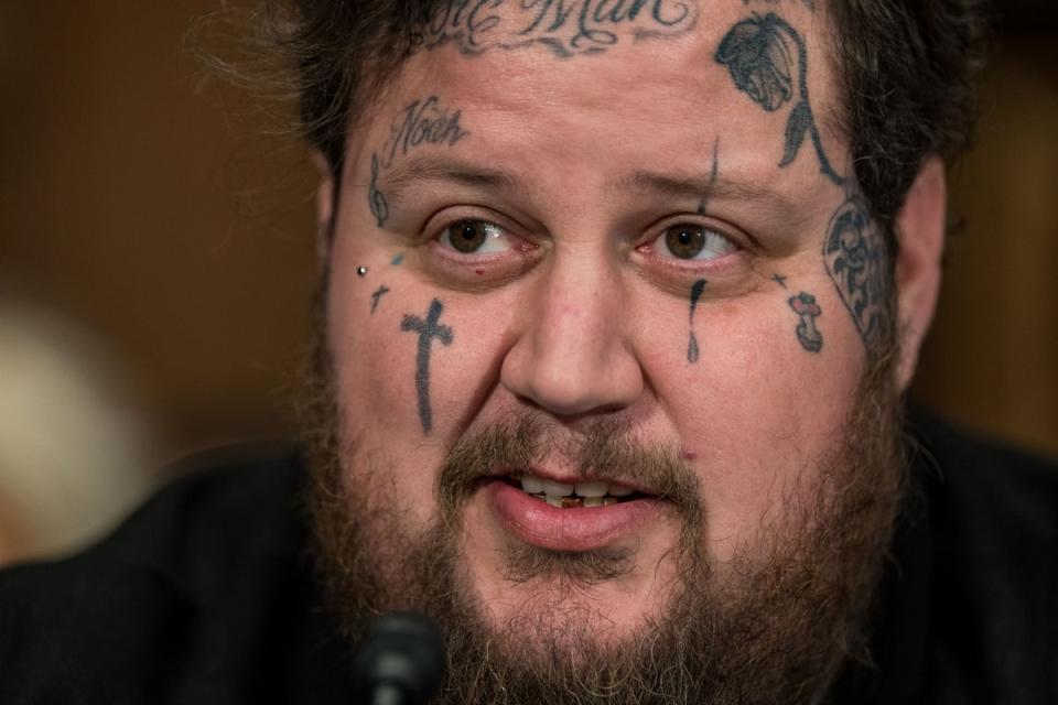 Jason ‘Jelly Roll’ DeFord testifies before the Senate Banking, Housing, and Urban Affairs committee on 11 January 2024 (Getty Images)