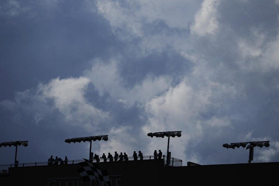 Fans wait for a NASCAR Cup Series auto race at Atlanta Motor Speedway to begin on Sunday, July 9, 2023, in Hampton, Ga. (AP Photo/Brynn Anderson)