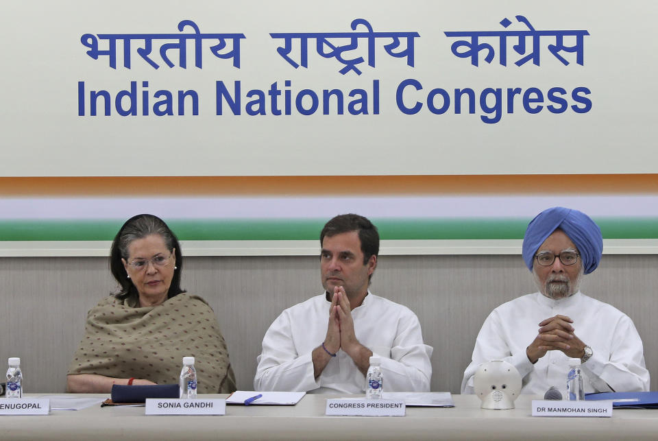 From left, Congress party leader Sonia Gandhi, her son and party President Rahul Gandhi, and former Indian Prime Minister Manmohan Singh attend a Congress Working Committee meeting in New Delhi, India, Saturday, May 25, 2019. The BJP's top rival, led by Rahul Gandhi, won 52 seats out of 542 seats in the Lok Sabha, the lower house of Parliament, after the official vote count finished Friday. (AP Photo/Altaf Qadri)