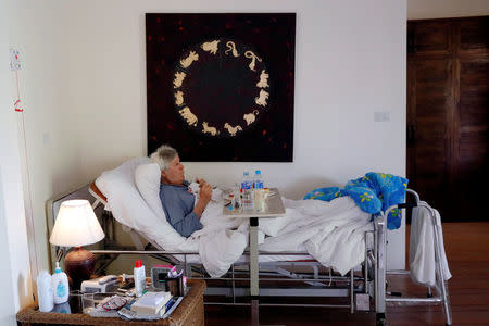 Charles, a retiree from England has breakfast in bed, while staying at the Care Resort in Chiang Mai, Thailand April 6, 2018. Picture taken April 6, 2018. REUTERS/Jorge Silva