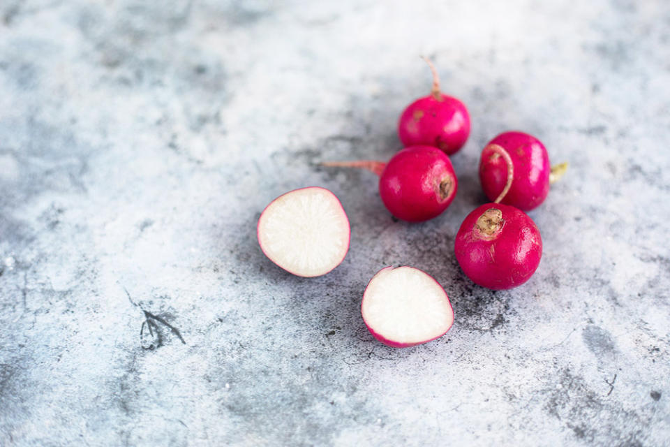 Slice the pink radishes as thinly as you can, perhaps with a mandoline.