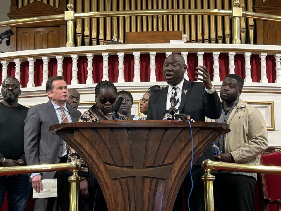 Civil-rights attorney Ben Crump, second from right, speaks during a news conference Tuesday, March 21, 2023 at First Baptist Church of South Richmond. Flanking Crump are, second from left, co-counsel Mark Krudys, Otieno's mother Caroline Ouko, and Otieno's brother Leon Ochieng. The news conference was called to address the indictments of 10 Henrico County sheriff's deputies and Central State Hospital security guards in Otieno's March 6 death in a hospital admissions area.