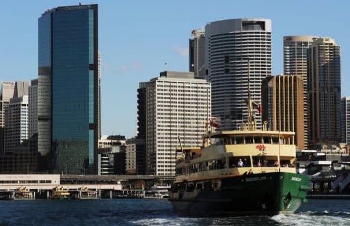 Australia's mining-powered economy grew 0.6% in the three months to June, slightly below forecasts, and 3.7% from a year earlier, weighed by China's slowdown and European woes