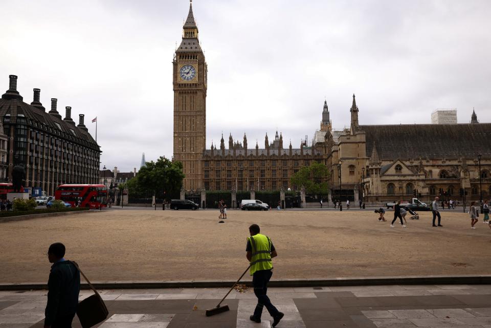 Parliament Square’s grass has been looking dry in London (REUTERS)