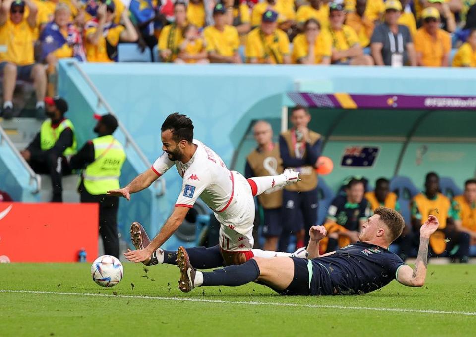 Souttar tackles Taha Yassine Khenissi during the Socceroos’ second Group D match against Tunisia.