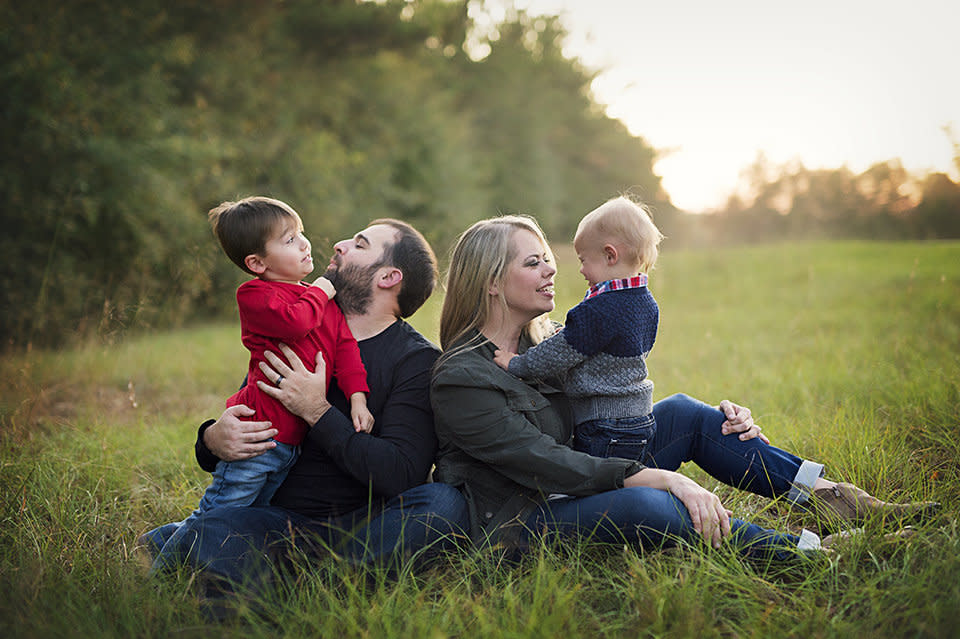 Stephanie Hicks poses with her husband and two sons. She was driven off the police force&nbsp;after the&nbsp;birth of her&nbsp;older boy. (Photo: Courtesy of Stephanie Hicks)