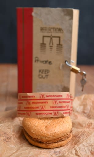 A pair of Aussies keep the McDonald's burger they bought in 1995 in a special locked box, and refer to the meal as their 'mate'