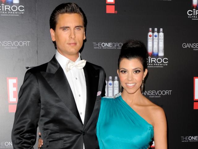 Kim Kardashian, along with sister Kourtney and Scott Disick