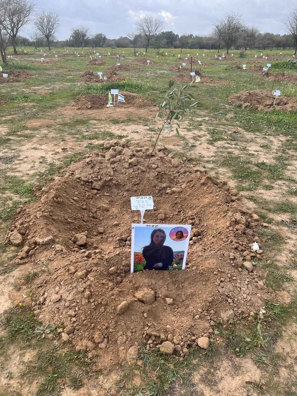 Four rabbis from metro Detroit visited the site of the Nova Music Festival in Israel. Pictured is a memorial at the site set up with a tree planted for each of the people at the festival who died on October 7th, when Hamas attacked. Pictured is a tree planted in memory of Chen Ben-Avi, one of the victims, and a photo of her.
