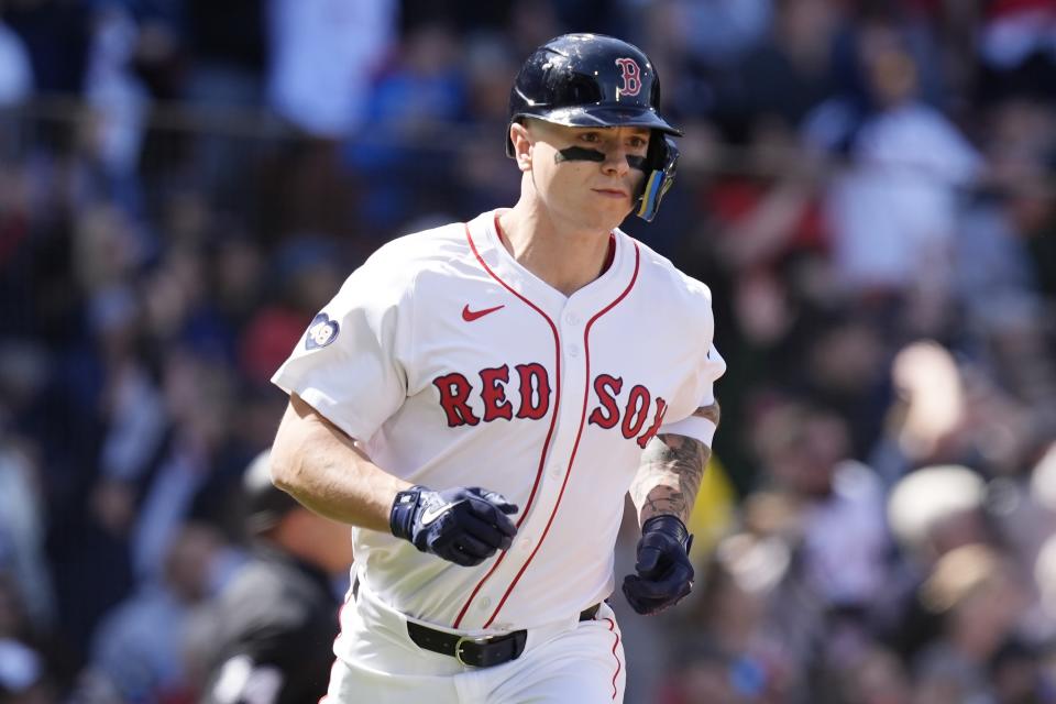 Boston Red Sox's Tyler O'Neill runs on his solo home run during the first inning of an opening day baseball game against the Baltimore Orioles at Fenway Park, Tuesday, April 9, 2024, in Boston. (AP Photo/Michael Dwyer)