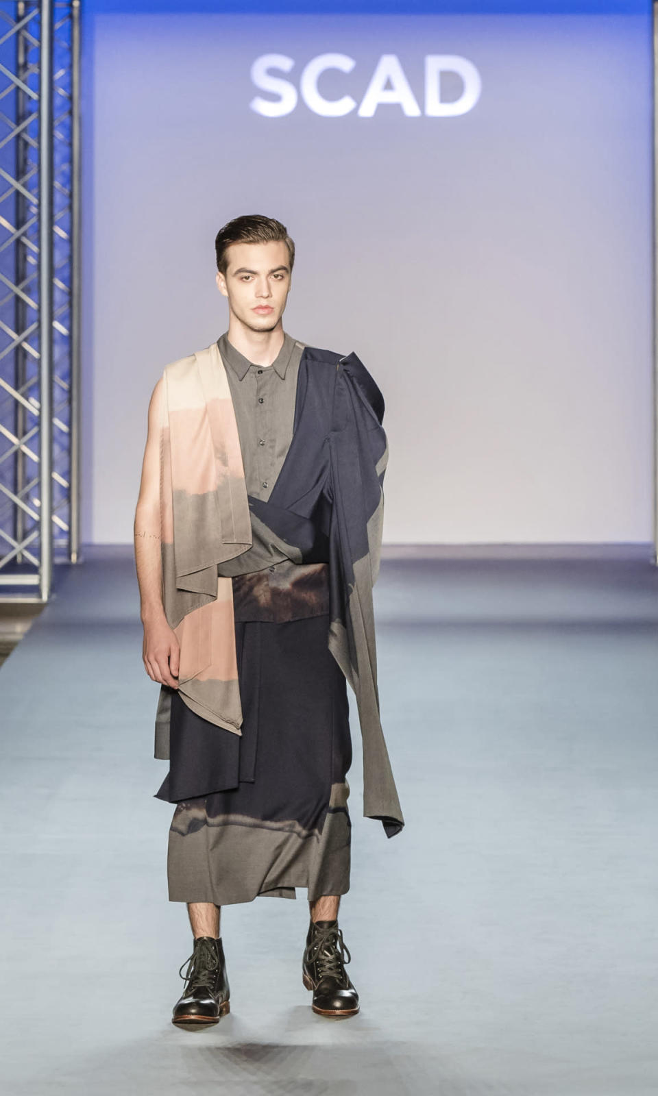 SCAD graduate Thomas Chu’s designs draped soft layers over stark menswear elements for an avant-garde effect.