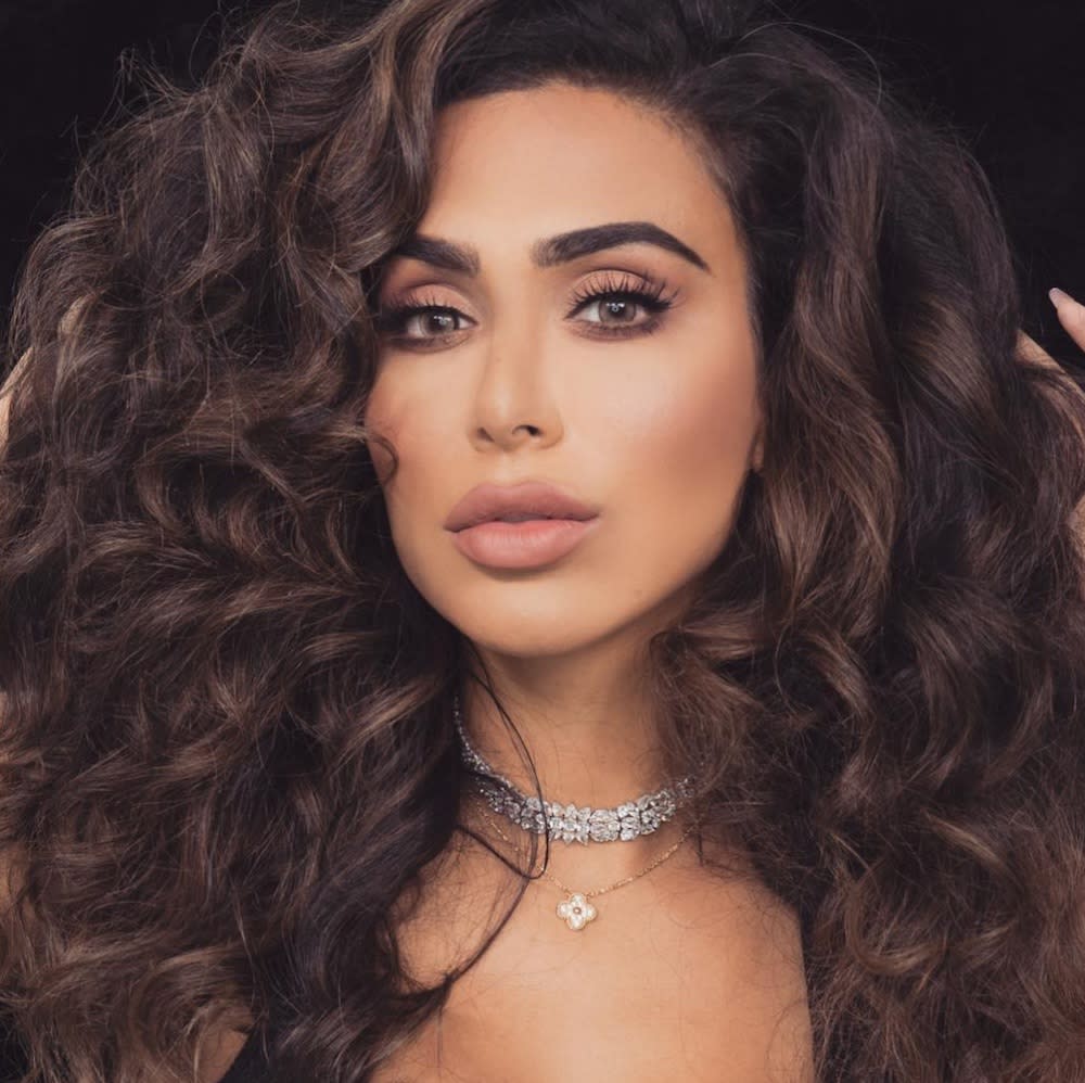 Huda Beauty swatched her upcoming liquid lipstick collection, and you’ll finally be able to find your perfect nude lip