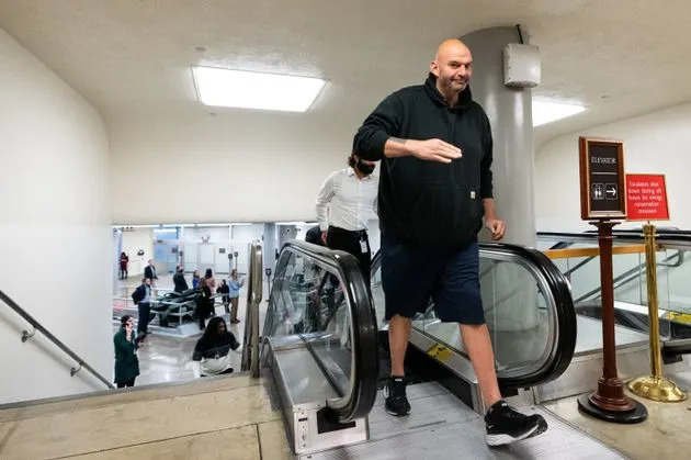 Sen. John Fetterman (D-Pa.) walks to vote in the U.S. Capitol.