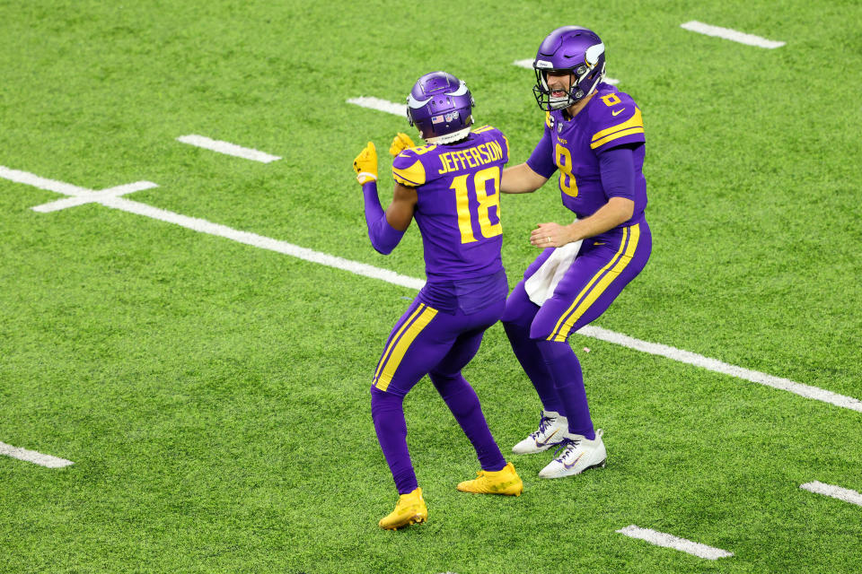 Kirk Cousins #8 and Justin Jefferson #18 of the Minnesota Vikings 