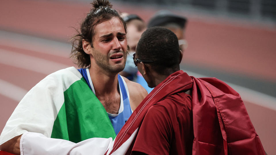 This is what the Olympics are all about. (Photo by Elif Ozturk Ozgoncu/Anadolu Agency via Getty Images)