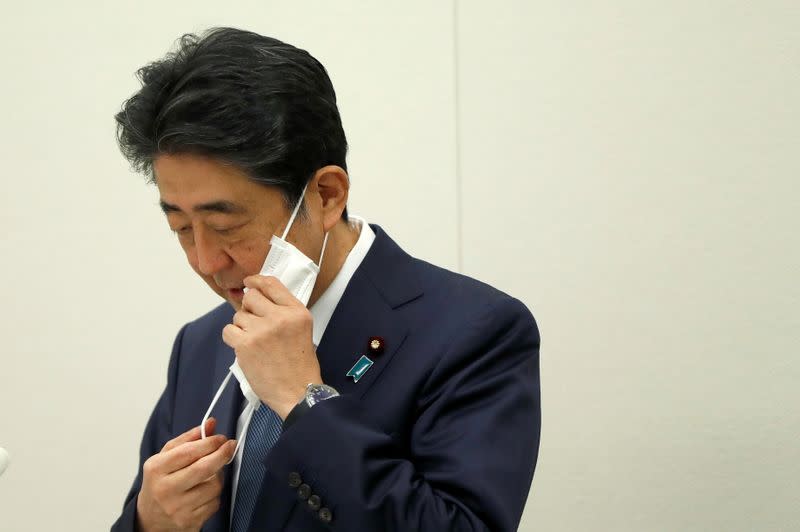 Former Japanese PM Shinzo Abe holds a news conference in Tokyo