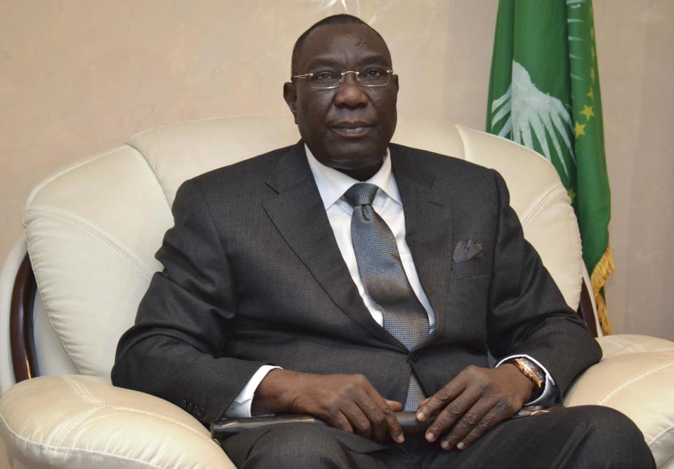 In this photo taken Thursday, Jan. 9, 2014, President of the Central African Republic Michel Djotodia sits to be photographed at a summit of the Economic Community of Central African States in N'Djamena, Chad. Michel Djotodia, the rebel leader who seized control of Central African Republic only to see the desperately poor country tumble toward anarchy and sectarian bloodshed that left more than 1,000 people dead, agreed to resign Friday, Jan. 10, 2014 along with his prime minister Nicolas Tiangaye, regional officials announced. (AP Photo)