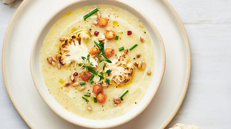 cauliflower soup with chives, roasted cauliflower and chickpeas