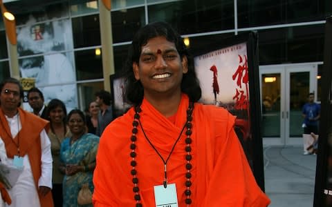 Nithyananda is believed to be living off the coast of Ecudaor  - Credit: Michael Buckner/Getty Images)