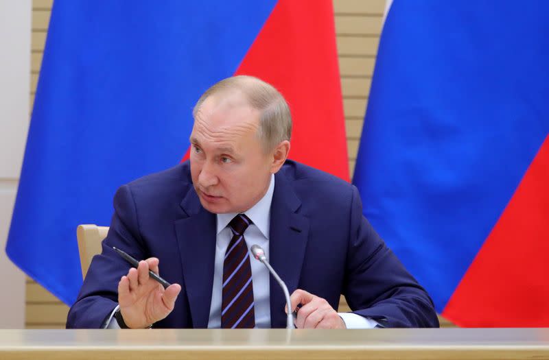 Russian President Vladimir Putin chairs a meeting to prepare amendments to the Russian constitution at Novo-Ogaryovo state residence outside Moscow
