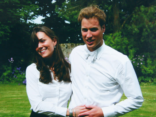 Prince William, with a fuller head of hair, and his future wife, Kate Middleton, at their college graduation ceremony in St. Andrew's in Scotland in 2005. (Photo: Getty Images)