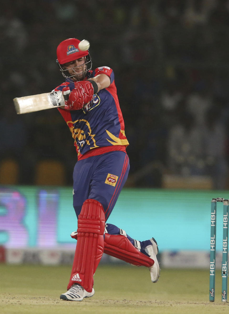 Liam Livingstone of Karachi Kings hits a boundary against Islamabad United, in the Pakistan Super League playoff at National Stadium in Karachi, Pakistan, Thursday, March 14, 2019. (AP Photo/Fareed Khan)
