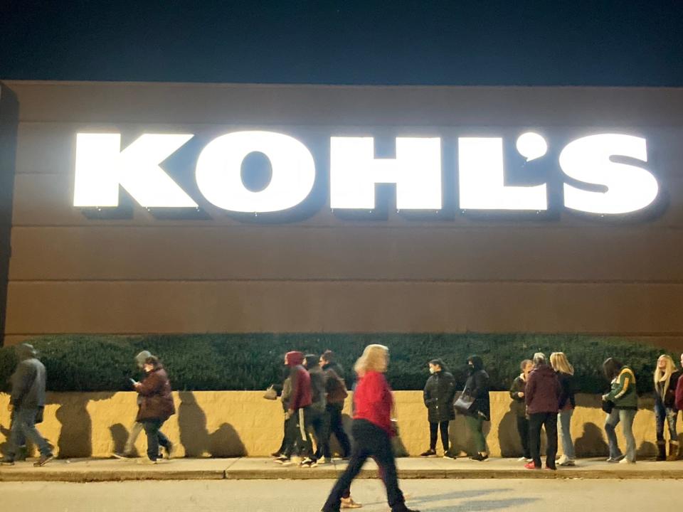 A line forms in front of Kohl's at White Oaks Plaza in Springfield, Ill. for its 5 a.m. opening Friday, November 26, 2021. About 30 people were in line when it opened, as the temperature hovered around 18 degrees.