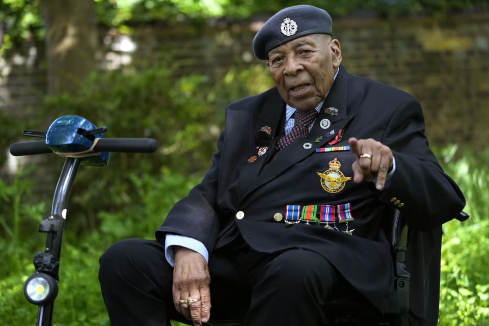 Gilbert Clarke a D-Day veteran gestures as he is interviewed near his home in east London, Wednesday, May 15, 2024. Clarke, now 98, is one of more than 3 million men and women from South Asia, Africa and the Caribbean who served in the British military during World War II. (AP Photo/Kirsty Wigglesworth)