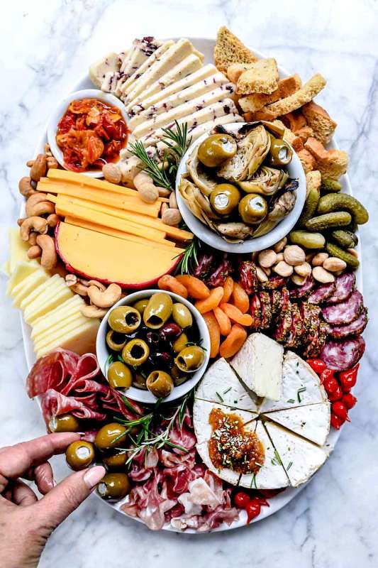 <p>Foodie Crush</p><p>Charcuterie boards loaded with all the antipasti snacks have taken over the internet. Here are tips for how to make your meat and cheese plates Instagram-worthy, along with a special treat for all to share.</p><p><strong>Get the recipe: <a href="https://www.foodiecrush.com/how-to-make-an-instagram-worthy-charcuterie-board/" rel="nofollow noopener" target="_blank" data-ylk="slk:Instagram Worthy Charcuterie Board;elm:context_link;itc:0;sec:content-canvas" class="link rapid-noclick-resp">Instagram Worthy Charcuterie Board</a></strong></p>