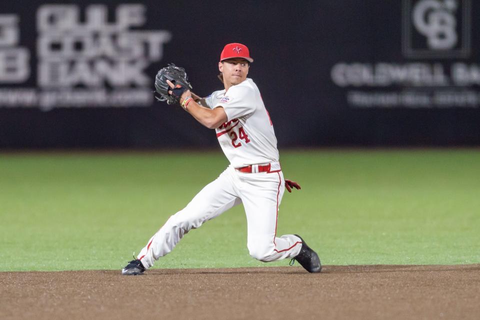 Shortstop Kyle Debarge makes a play as the Louisiana Ragin Cajuns take on UC Irvine at M.L. "Tigue" Moore Field at Russo Park.  Friday, Feb. 18, 2022.